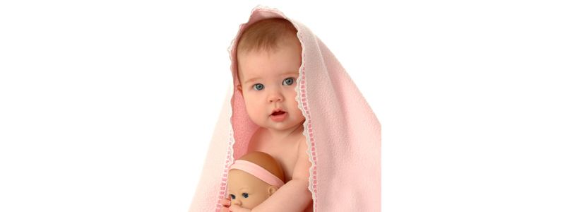 infant with a blanket