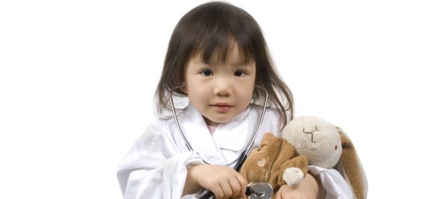 child dressed up as a doctor