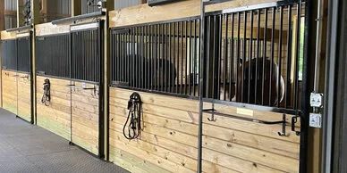 horse stalls in barn