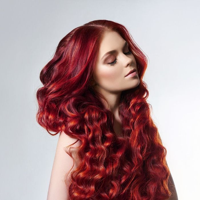 woman with reddish purple hair