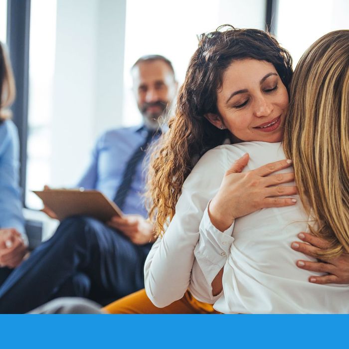 A woman comforting another woman 3.jpg