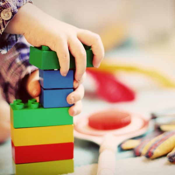 A child palying with toy blocks. A child palying with toy blocks.