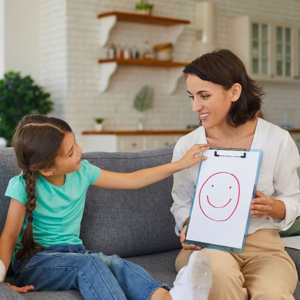 A child psychologist with a patient. A child psychologist with a patient.