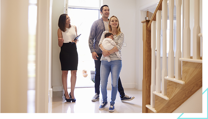 couple speaking to a realtor