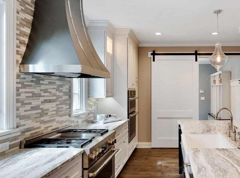 modern kitchen with oven range hood