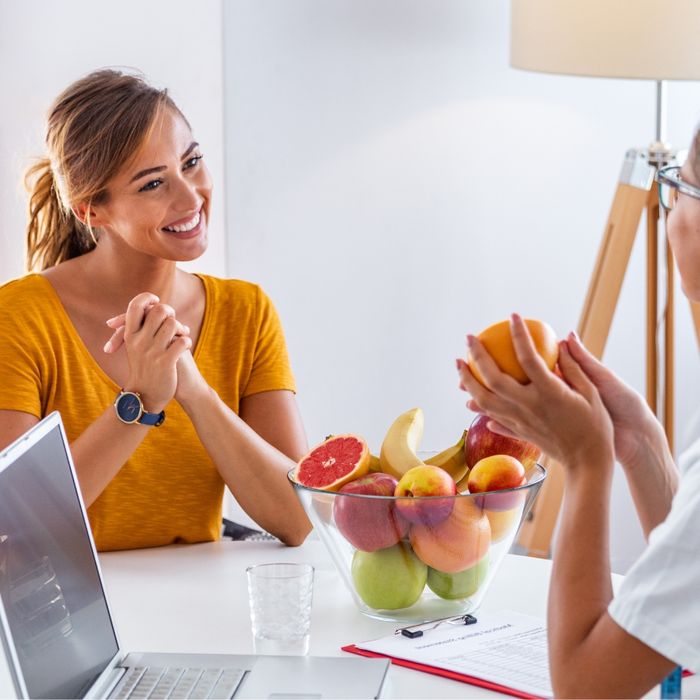 Woman meeting with her nutrition coach