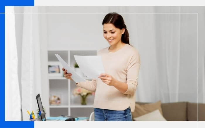 woman looking at papers