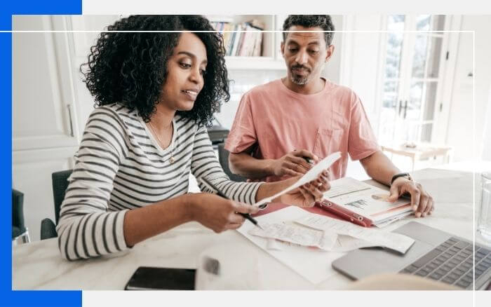 couple completing taxes