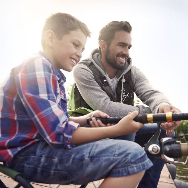 father and son fishing together father and son fishing together