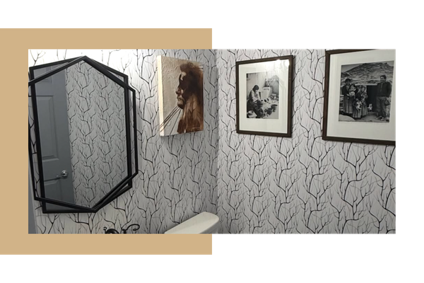 Grey bathroom wallpaper with a tree design