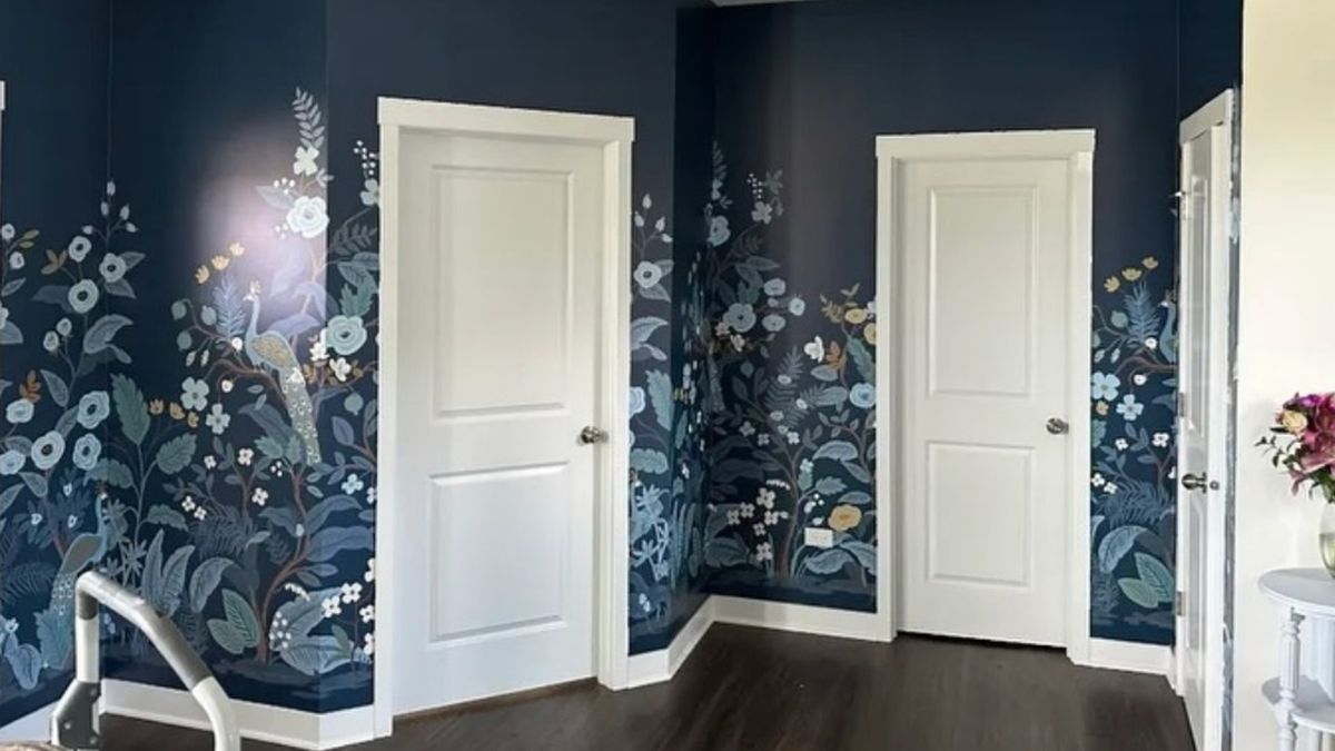 Two doors with blue wallpaper designs