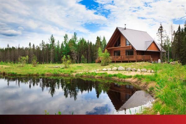 log cabin by lake