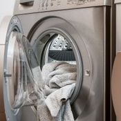 laundry machine with clothes in it