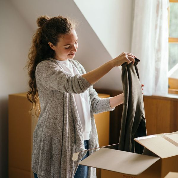 woman packing clothes