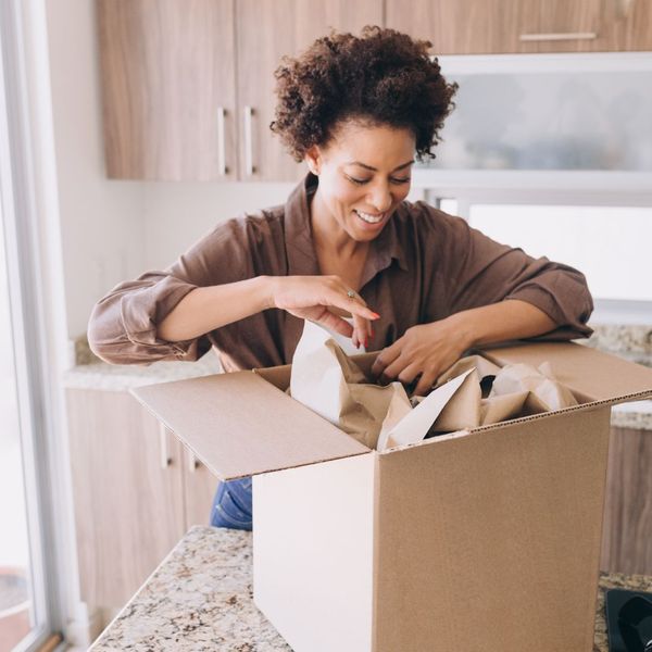 woman packing boxes