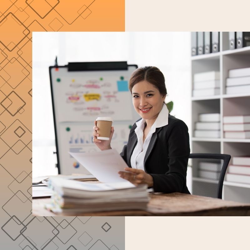 a bookkeeper with a stack of papers Bookkeeping.jpg