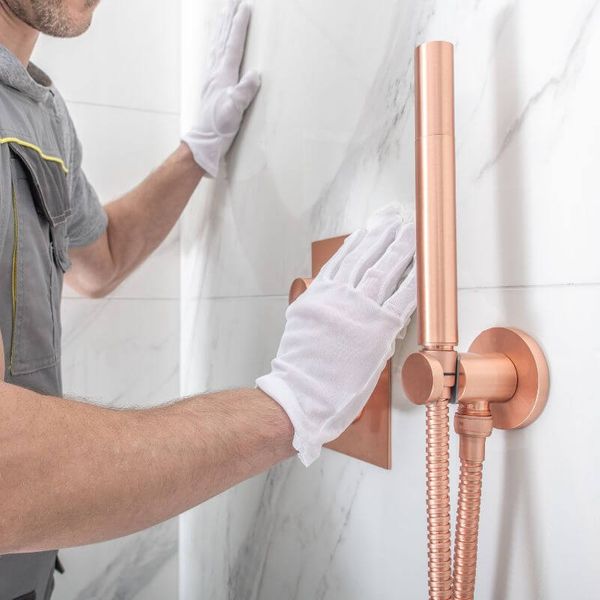 person installing shower