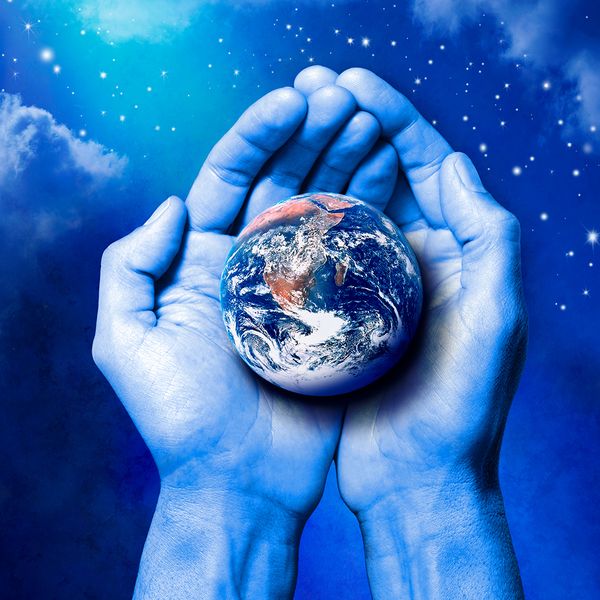 Graphic of hands holding the earth