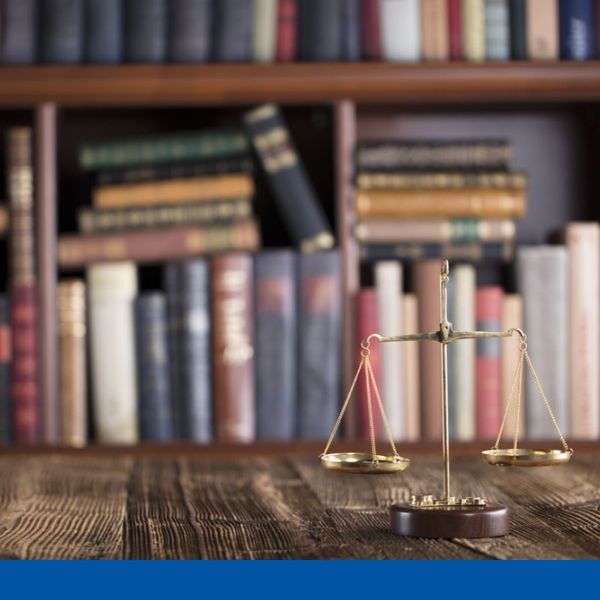 legal book with scales of justice legal book with scales of justice