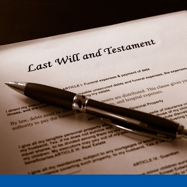 last will and testament with pen on top