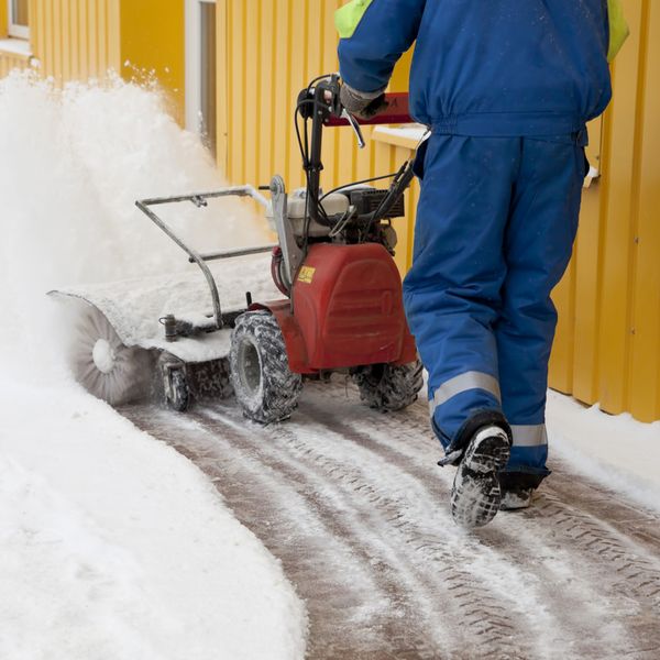 Person Snow Blowing