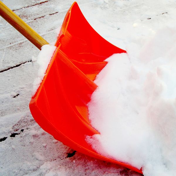 a red snow shovel