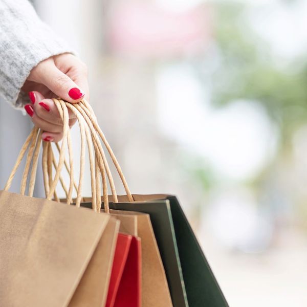 woman carrying shopping bags