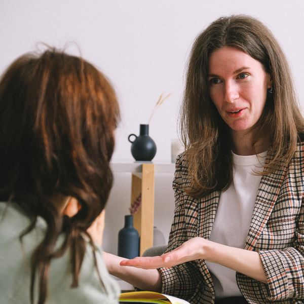 Woman speaking to a therapist