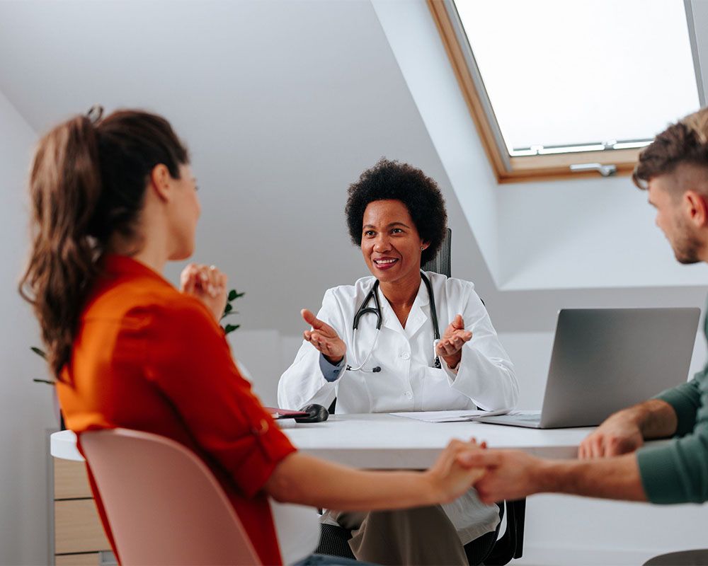 OBGYN talking with couple