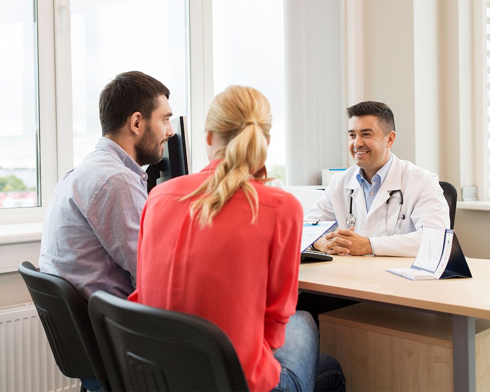 OBGYN talking with couple