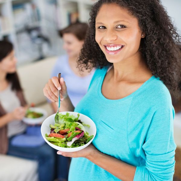 woman eating a salad