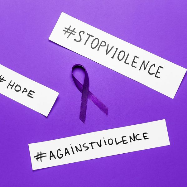 Domestic violence hashtags with purple ribbon