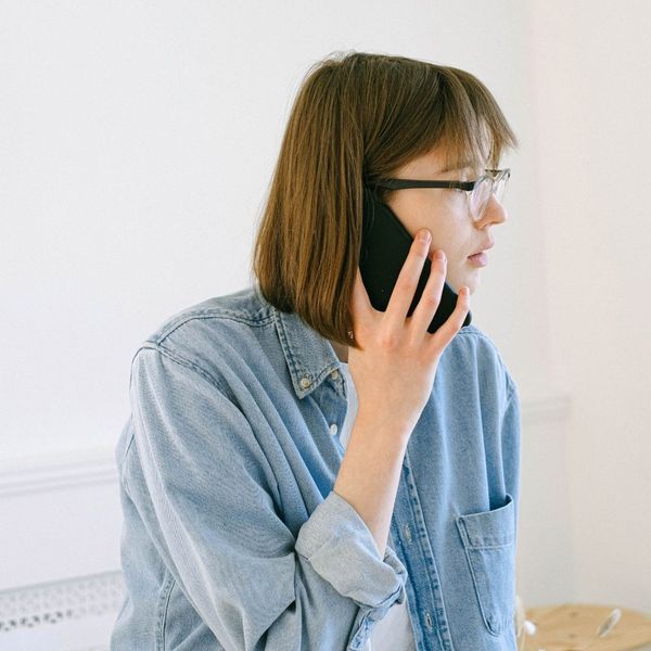 Woman talking on the phone.