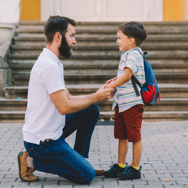 dad dropping young son off at school