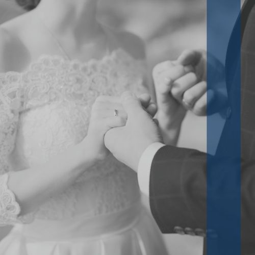 bride and groom holding hands