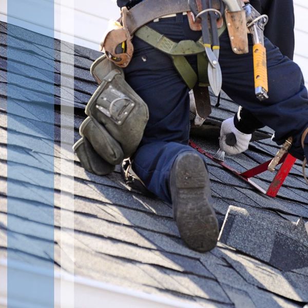 roofer repairing roof 