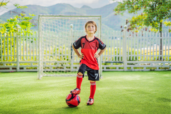 kid with a soccer ball.