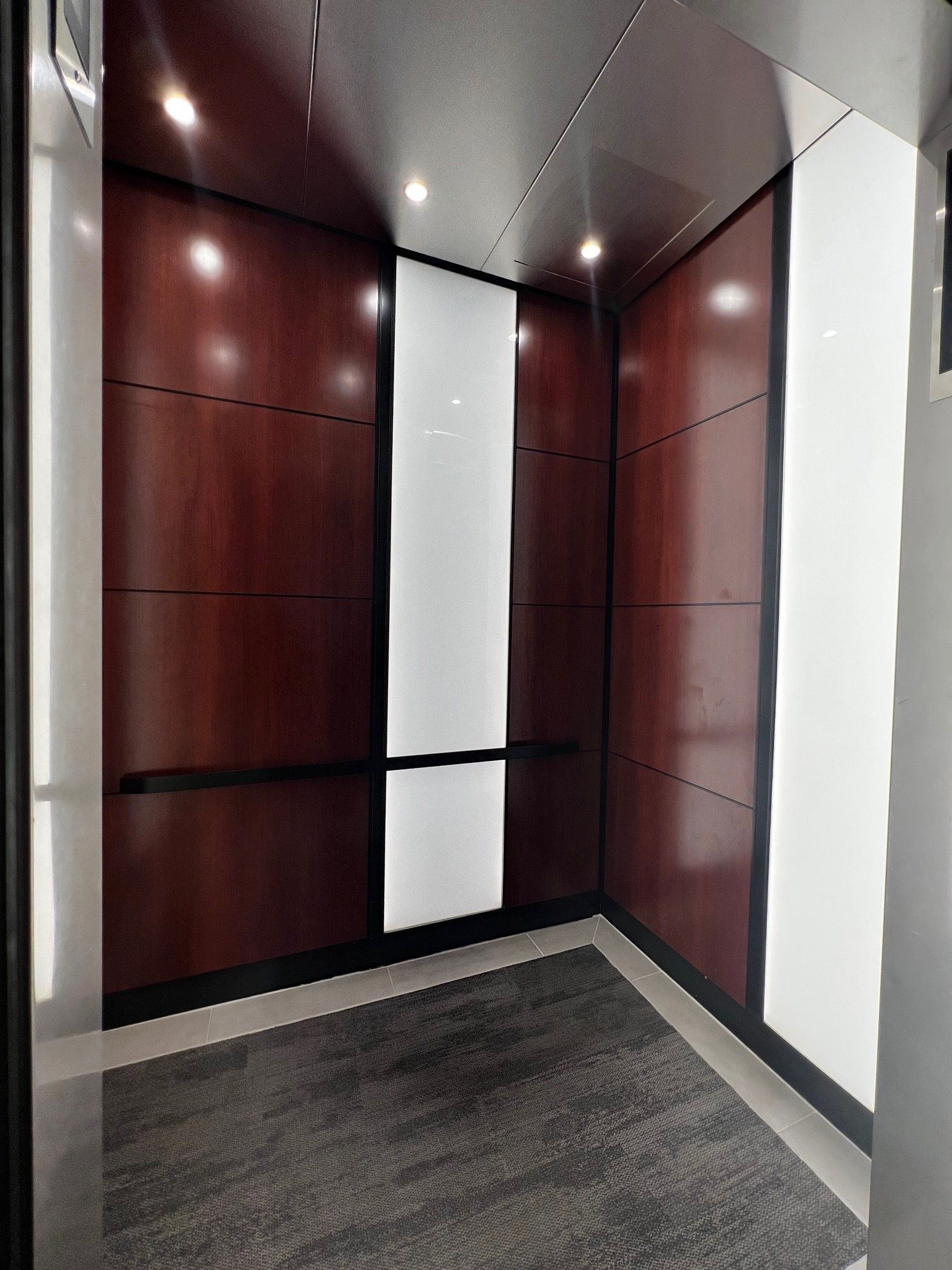 Laminate wall panels in an elevator Standard Elevator Interior