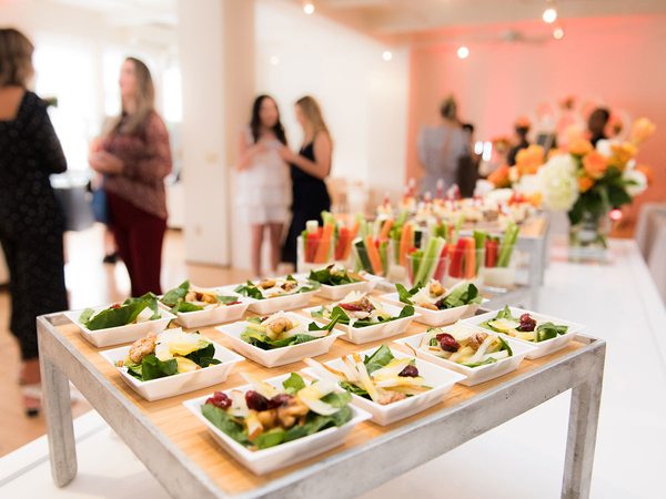 image of a table with small individual salads at an event 