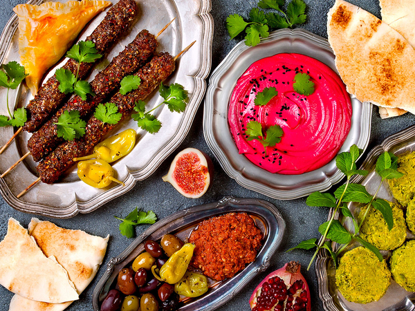 image of a spread of food on silver platters