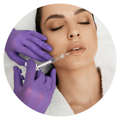 Woman receiving lip injection, eyes closed, purple gloves