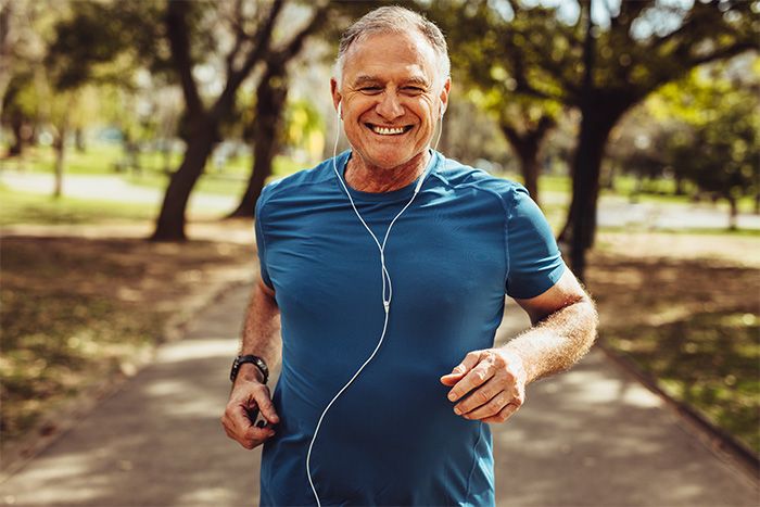 Mature man jogging in park