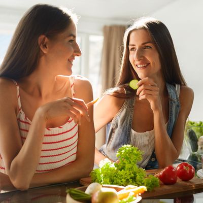 Friends encouraging each other to eat healthy
