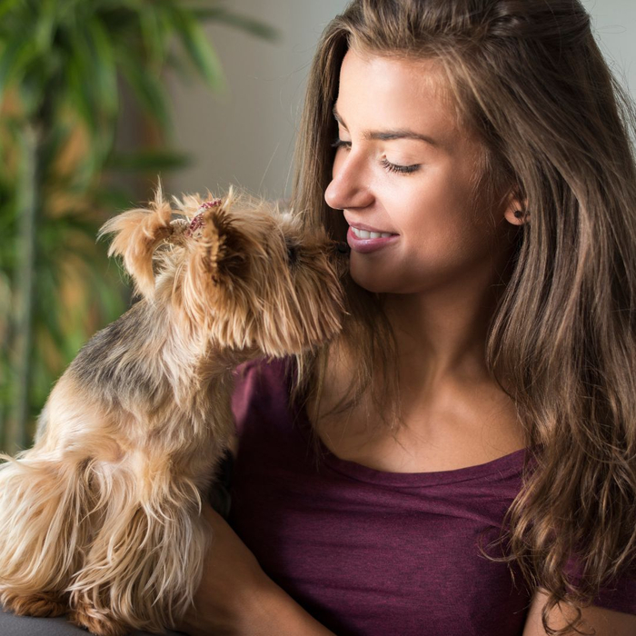 Woman petting her dog