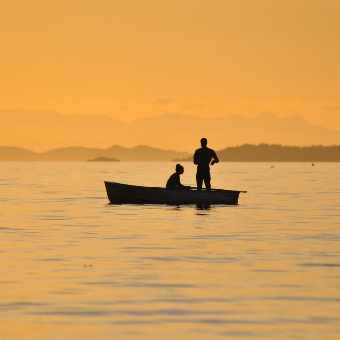 people fishing from a boat