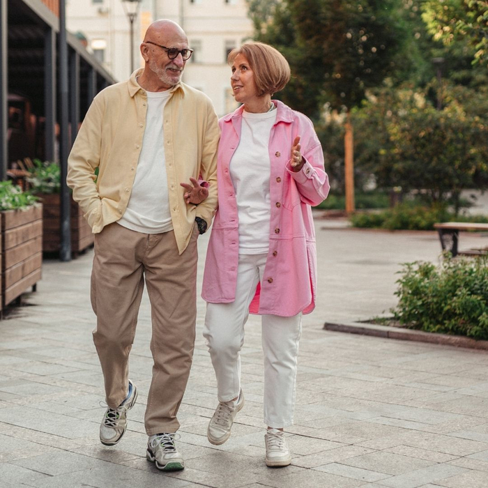 adults walking through town