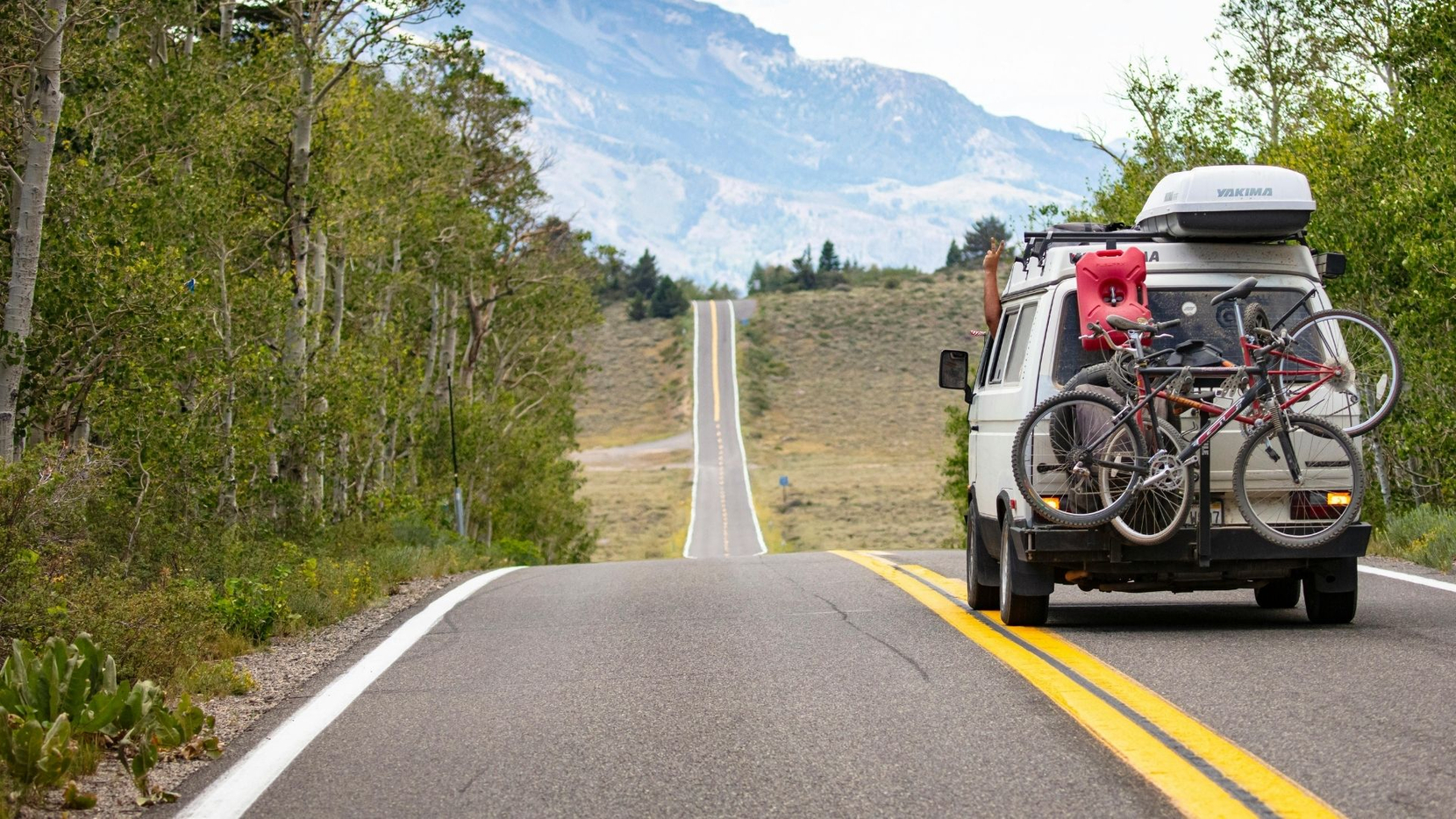 people going on a day trip in a van