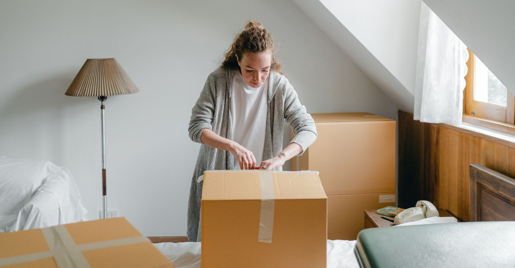 woman unpacking boxes