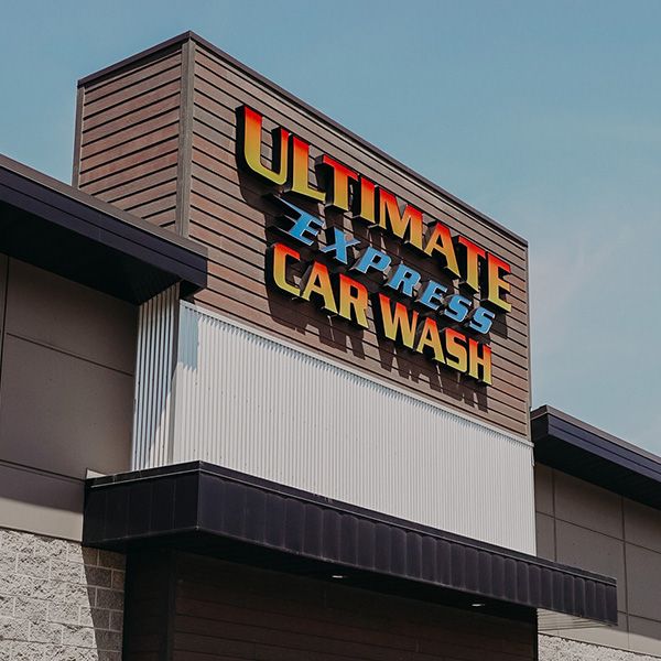 ultimate express car wash storefront sign