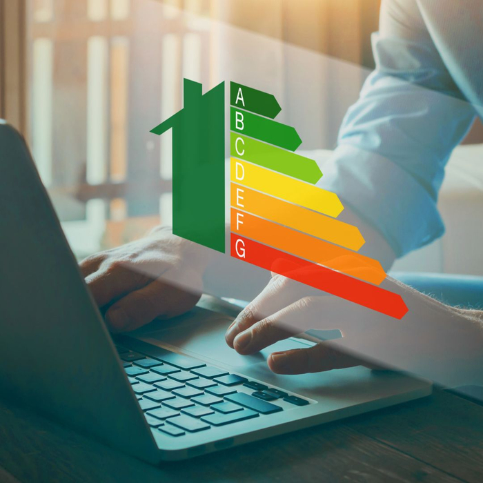 Man at computer with rating graphic